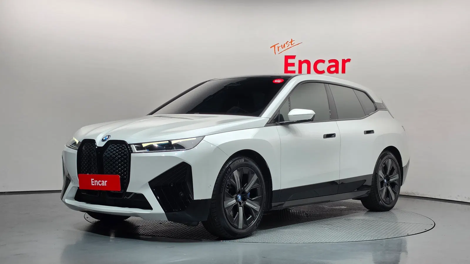 BMW iX xDrive50 Sport Plus 2023 — photo 1 sur 43