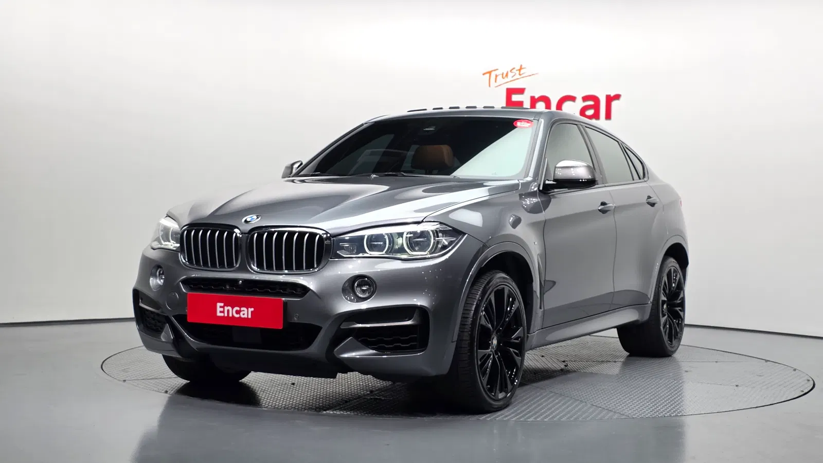 BMW X6 (F16) M50d 2018 — photo 1 sur 34