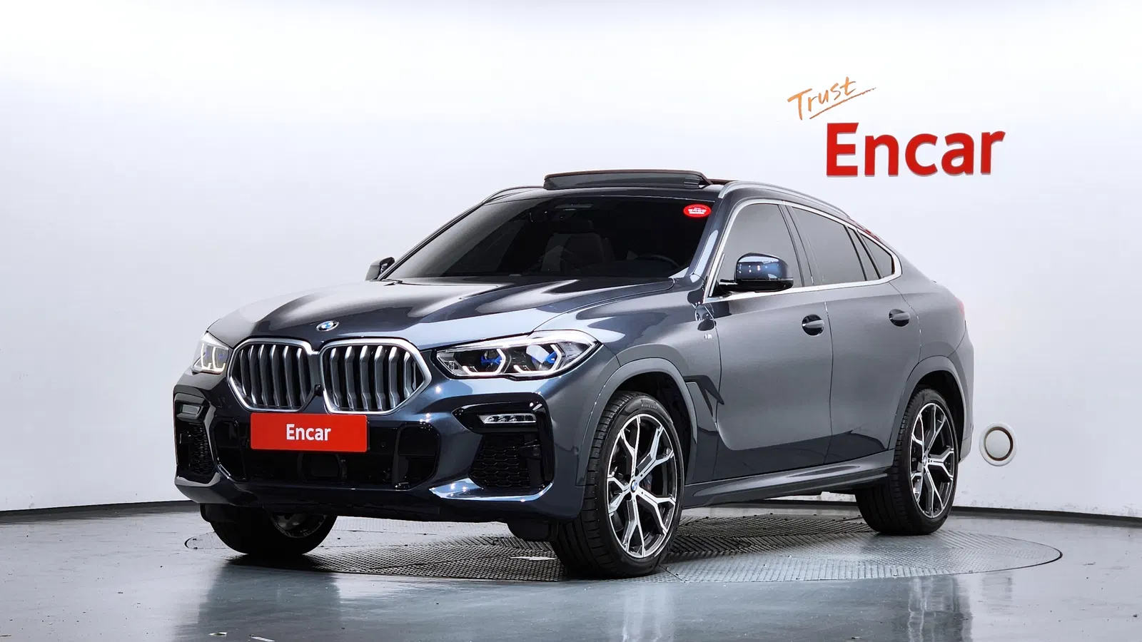 BMW X6 (G06) xDrive40i M Sport 2021 — photo 1 sur 36