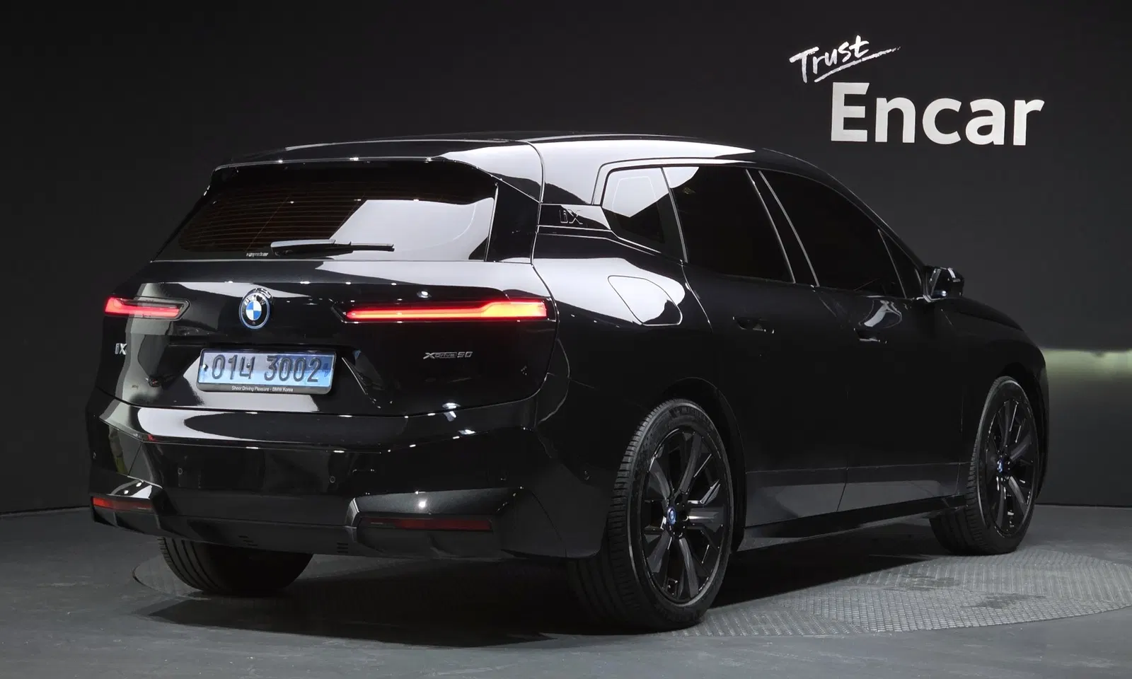 BMW iX xDrive50 Sport Plus 2023 — photo 1 sur 37