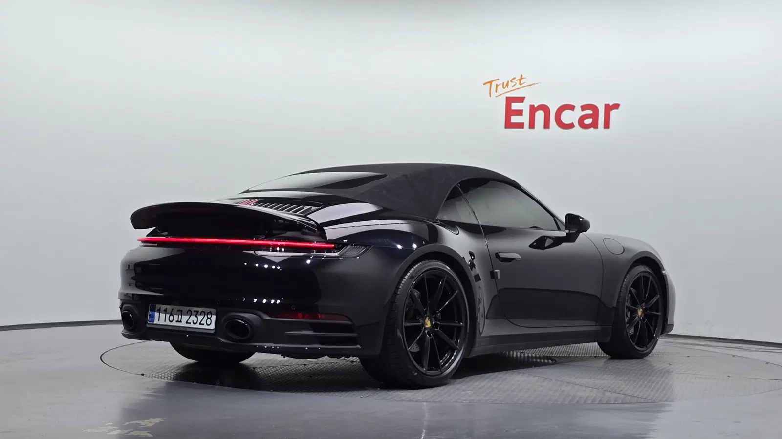 Porsche 911 (992) Carrera 4 Cabriolet 2021 — photo 1 sur 36