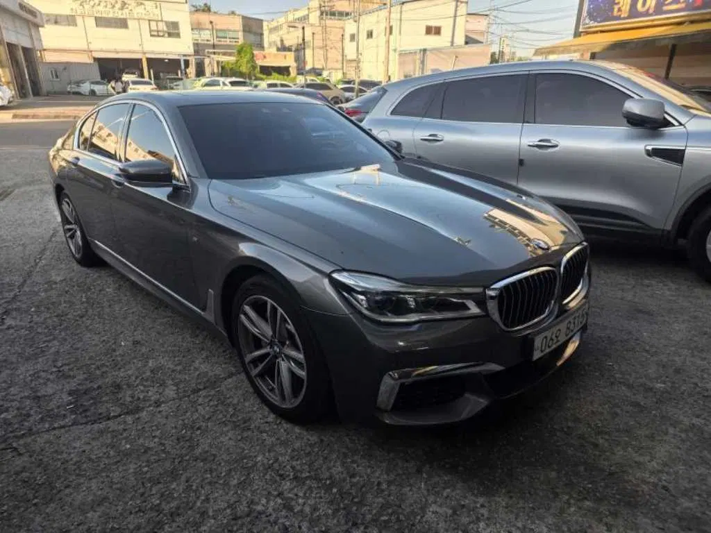 BMW Série 7 (G11) 730d xDrive M Sport 2018 — photo 1 sur 25