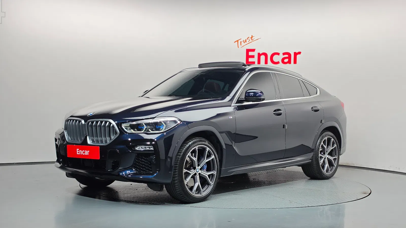 BMW X6 (G06) xDrive40i M Sport 2021 — photo 1 sur 36