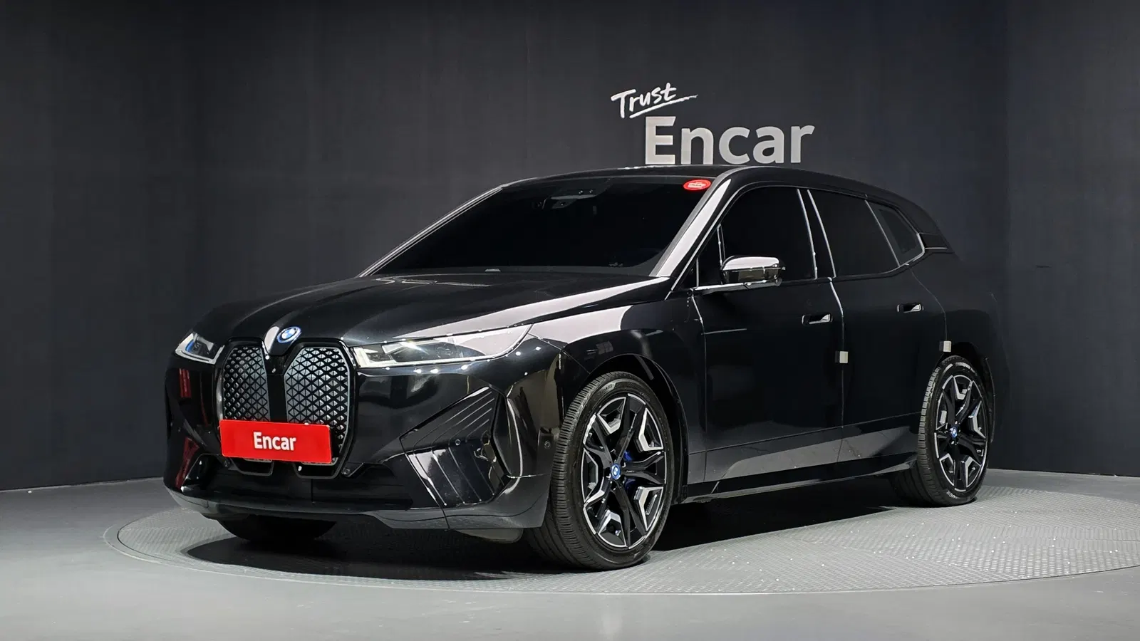 BMW iX xDrive50 Sport Plus 2022 — photo 1 sur 34