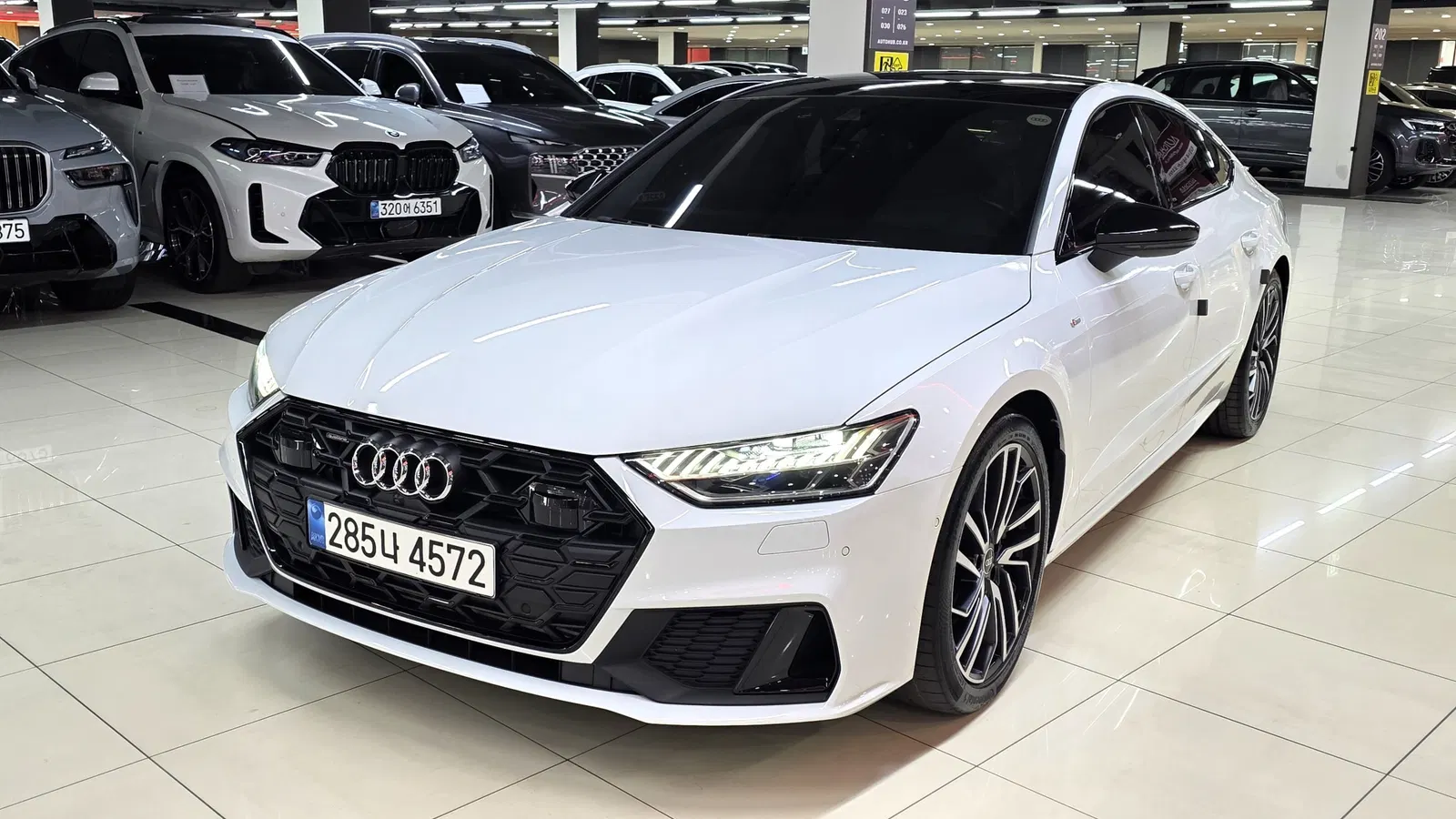 Audi A7 (4K) 55 TFSI Quattro Premium 2024 — photo 1 sur 26