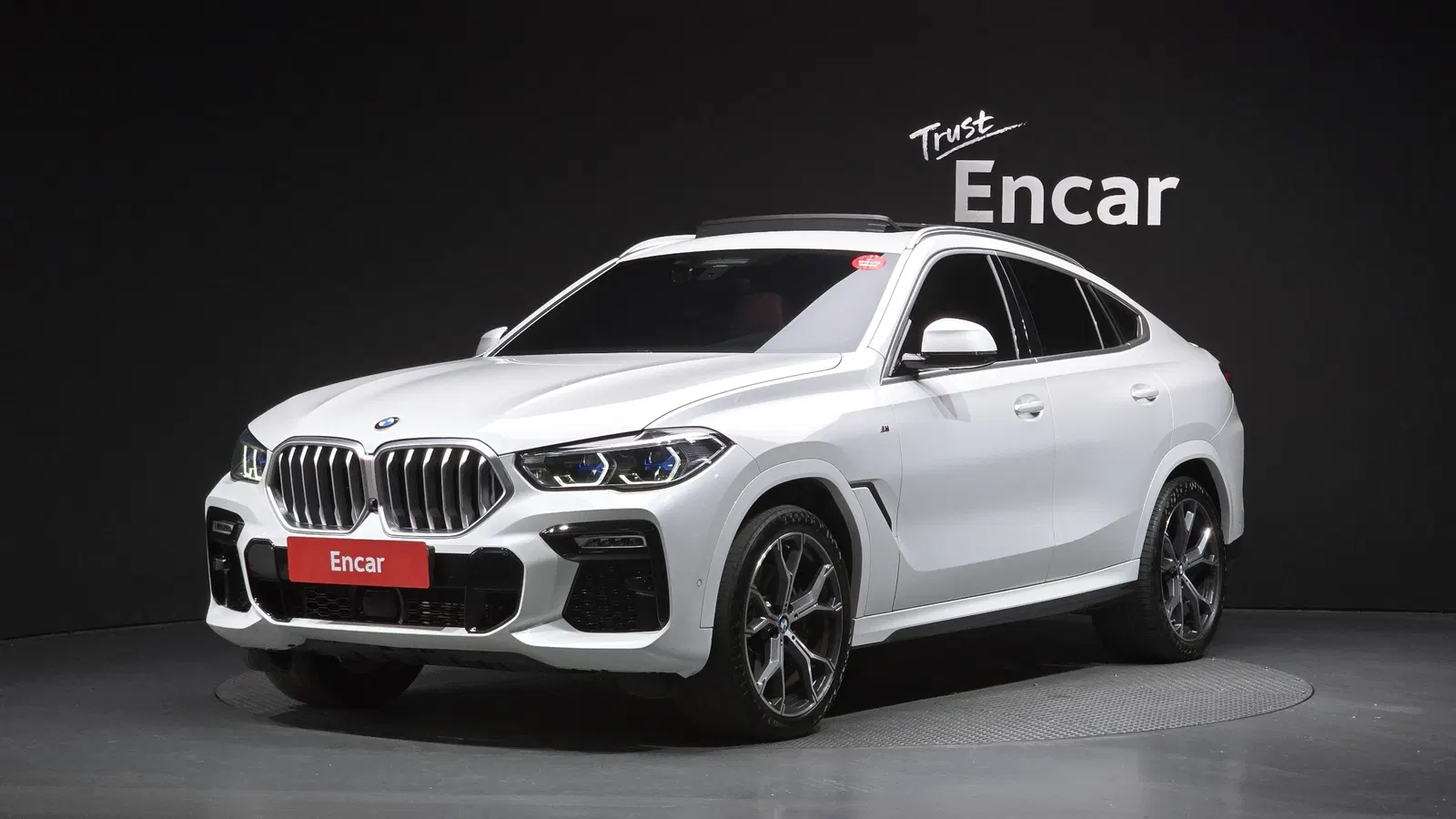BMW X6 (G06) xDrive40i M Sport 2021 — photo 1 sur 20