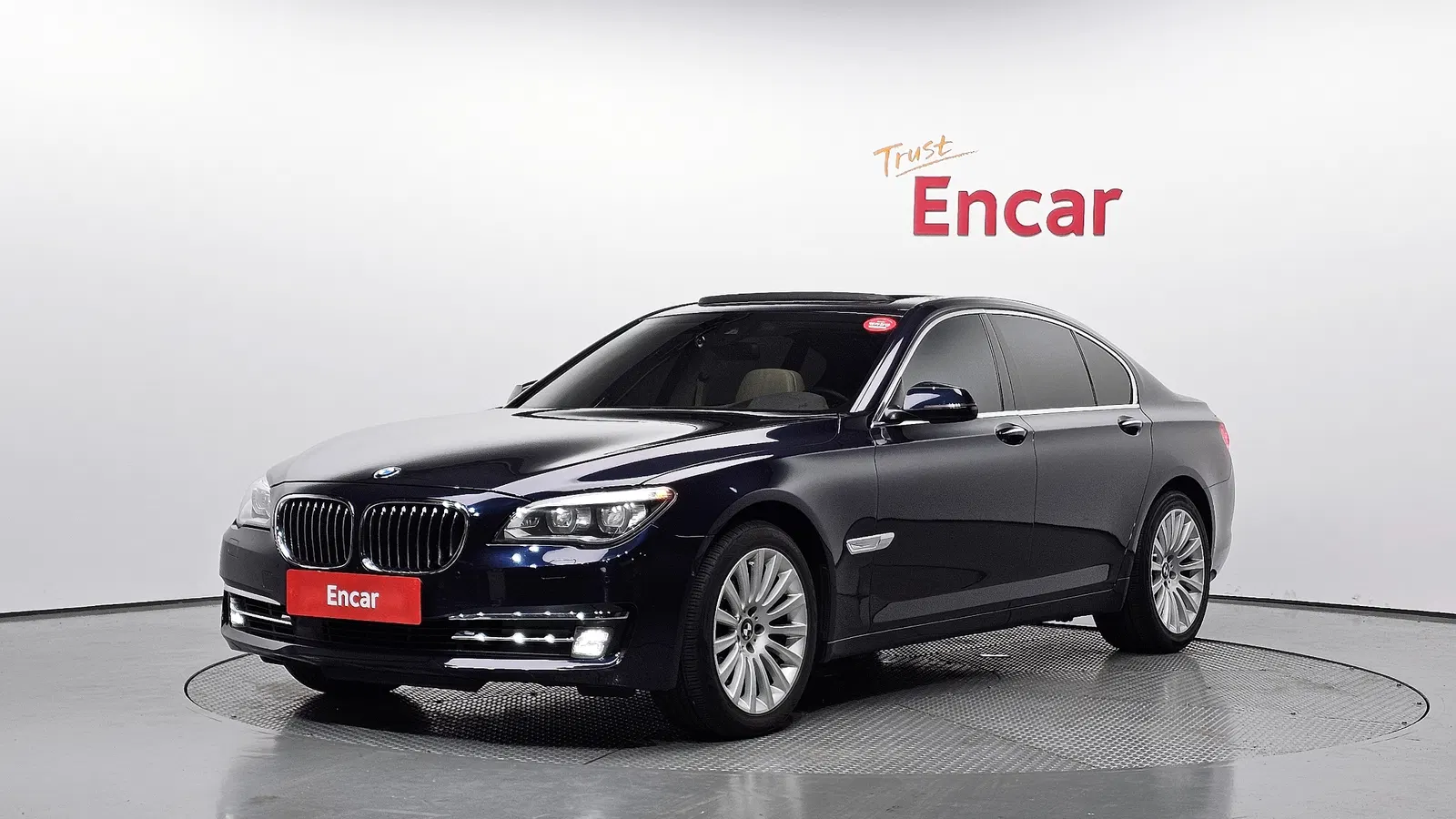 BMW Série 7 (F01) 740i 2013 — photo 1 sur 20