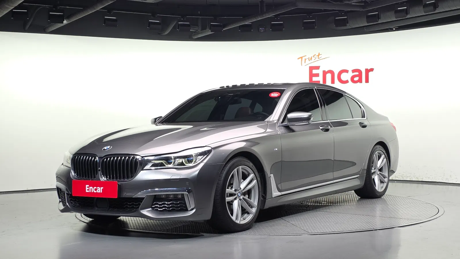 BMW Série 7 (G11) 740d xDrive M Sport 2019 — photo 1 sur 26
