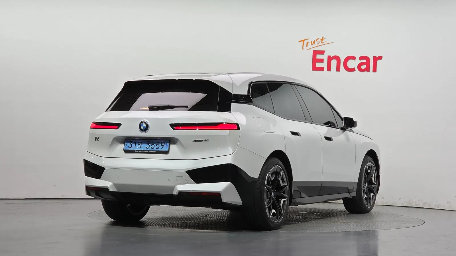 BMW iX xDrive50 Sport Plus 2022 — photo 1 sur 42