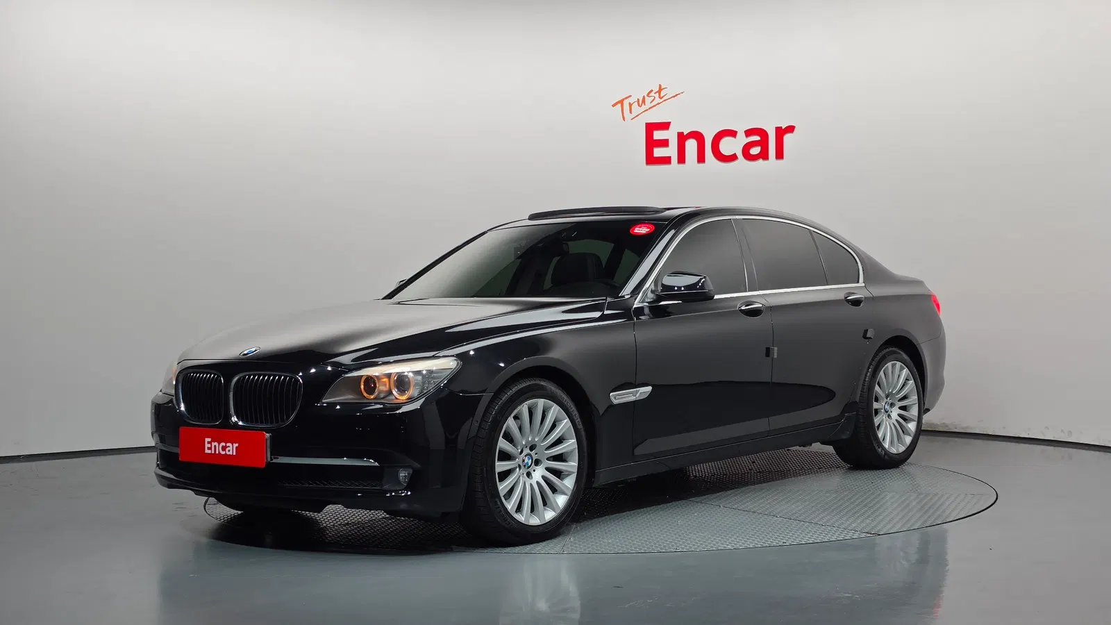 BMW Série 7 (F01) 740i 2012 — photo 1 sur 20