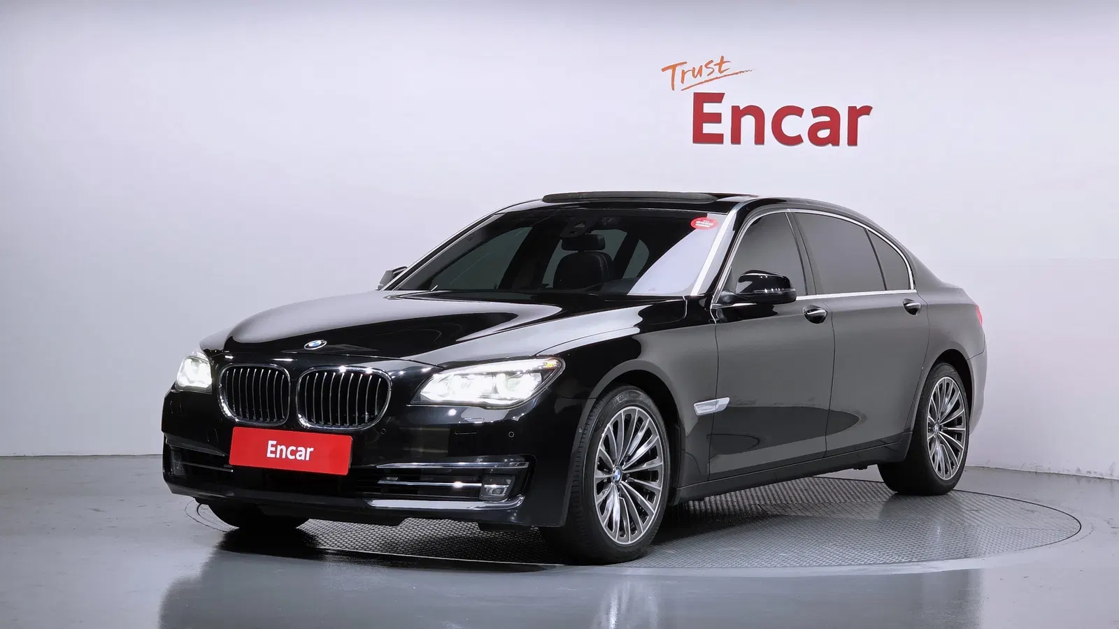 BMW Série 7 (F01) 750Li xDrive 2014 — photo 1 sur 20